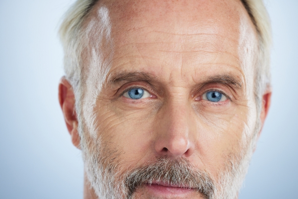 mature man with clear blue eyes